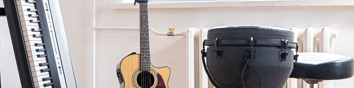 piano-keys-acoustic-guitar-interior-bright-room